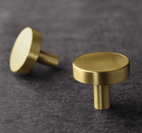 Deurknop rond messing