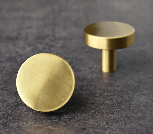 Deurknop rond messing